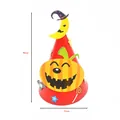 Handmade Halloween red paper cone hat featuring a pumpkin face and size dimensions - One Size / Red Pumpkin Face Style