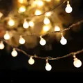 Warm glowing frosted ball LED string lights perfect for festive Christmas holiday decor. - Warm White Style (4902730068768) / Plug-in Type 28 Heads