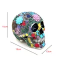 Detailed view of floral resin skull Halloween gift with 15cm x 19cm x 13cm dimensions - Colorful Floral Relief Style (G8031)