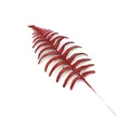 Close-up of a vibrant red glitter artificial fern leaf for festive Christmas tree decoration - Red