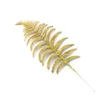 Macro view of a glittery golden artificial fern leaf for Christmas decor. - Gold