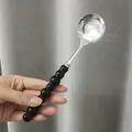Stainless steel round spoon with black beaded handle for kitchen dining and home use - Black