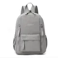 Grey casual mini backpack for women and men, versatile multi-pocket small daypack, daily use. - Light Gray