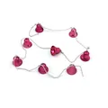 Detail view of pink metallic Christmas bell garland with silver bead chain connector - Rose Red