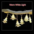 Warm white LED Christmas tree string lights hanging on a natural wood branch for festive decor - Plug-in Version / Warm White