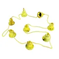 Close-up detail of a golden Christmas bell string featuring ornate embossed patterns - Gold