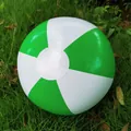 Green and white 36cm inflatable beach ball for kids water play in a grass field - Green/White