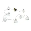 Detail view of silver Christmas bell garland string with ornate embossed floral patterns - Silver