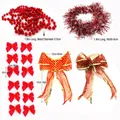 Detail of Christmas tree decoration set including red garland, tinsel and bows. - Red Style / 16 Pieces