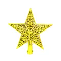 Gros plan de l'étoile dorée évidée pour cime de sapin de Noël avec des motifs de volutes - 15cm 25g / Or