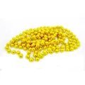 Detailed view of shiny golden bead chain for Christmas tree decoration and festive gifts - Gold Round Beads