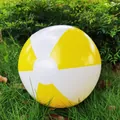 36cm yellow and white inflatable beach ball resting on green grass in natural light - Yellow/White