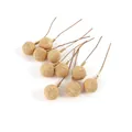Detail view of golden artificial berries with textured surface for Christmas DIY crafts - Gold