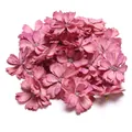 Detailansicht von rosa künstlichen Gänseblümchen-Blütenköpfen für DIY-Hochzeiten - Rosa