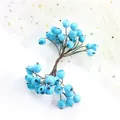 Bevroren blauwe kunstmatige schuimbessenstelen voor elegante DIY bruiloft decoraties - Meerblauw
