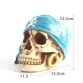 Detailed pirate skull figurine with blue bandana and dimensions: 15.5x13.5x12.5cm. - Pirate Skull Ornament (8039)