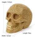 Golden rhinestone-studded resin skull decoration showing dimensions: 18x12.5x13.5cm - 6143 Gold (6143)