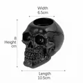 Black resin skull ashtray and candle holder with dimensions: 10.5x6.5x8cm - Black