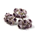 Primo piano di mini peonie artificiali viola vintage per decorazioni fai-da-te - Viola