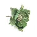 Detail view of green velvet artificial Christmas magnolia flower with glitter accents. - Green