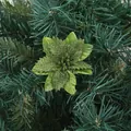 Close-up detail of green glitter artificial poinsettia flower for Christmas tree decoration - Green