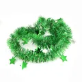 Close-up of 2m green star tinsel garland for Christmas and holiday party decoration - Green