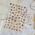Close-up detail of retro red-brown maple leaf metal nail art stickers for DIY - Reddish Brown Maple Leaf Metallic Style (to6132)