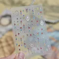 Close-up of MS 1048 jelly nail art stickers with colorful gemstone designs. - Colored Gemstone Embossed Style (MS1048) / MS1048-Jelly