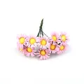 Close-up of mini artificial pink daisies with textured fabric petals and yellow centers - 100 Flowers/Pack / Pink