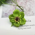 Testa di fiore di camelia artificiale verde per ghirlande e bouquet di fiori fai da te - Confezione da 60 Pezzi / Verde