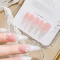 Macro detail of handmade French gradient press-on nails with pearl accents. - S / Pearl Girl (CD005) / Long Pointed Oval