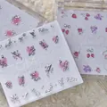 Detailed view of luxury strawberry and wing nail art charms on a white display card. - MD038 (Punk Sweet Mix Rhinestone Style)