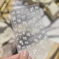 Primer plano de pegatinas para uñas con brillo de concha y lazos de lunares - Estilo Lazo Vintage (MS1012) / Brillo de Concha