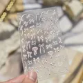 Primer plano de pegatinas para uñas con varios patrones de lazos y cintas lindos. - Estilo Lazo Minimalista (MS1014) / Brillo de Concha
