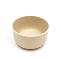 Vista detallada del tazón de paja de trigo con textura moteada y diseño minimalista. - Beige