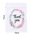 Dettaglio sacchetto regalo in organza bianca con stampa ghirlanda floreale e testo 15x10cm - Stampa Thank You / 8x10cm / Bianco