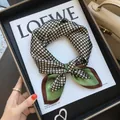 Elegant faux silk square scarf featuring a sophisticated green and brown geometric lattice pattern - 70cm / Colorblock Circles