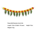 Marigold flower garland with green leaves for Day of the Dead decoration - Horizontal Bar With Mango Leaves / 1.1m (22 Balls) / Yellow Orange