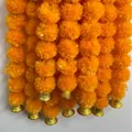 Vibrant orange artificial marigold flower garland strings with decorative golden bells. - 1.5m with 30 Flowers / Orange