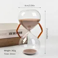 Modern 30-minute glass hourglass timer with decorative amber handles and brown sand - Amber Handle Hourglass (30 Minutes) / 9x17cm