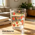 Transparent high borosilicate strawberry pattern glass cup on a sunlit wooden table - 350ml / Strawberry Cup