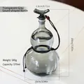 Handcrafted 570ml transparent grey gourd-shaped glass bottle with detailed dimensions - 570ml Pack / Gray