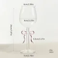 Creative clear glass wine goblet with a pink bowknot and detailed dimension markers - Wine Glass / Pink