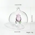 Transparent glass Christmas ornament ball with a pink rose inside, 8cm diameter - Rose