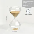 Decorative small octagonal glass hourglass timer with gold sand, 15 minutes duration. - Transparent Octagonal Hourglass (sl2073) / 15 Minutes - Small / Transparent Gold Sand