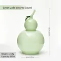Eleganter jade-grüner Vorratsbehälter in Flaschenkürbis-Form mit Deckel für Süßigkeiten - Grün