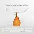 Kreativer bernsteinfarbener Obstständer aus Glas in Birnenform für Snacks und Desserts - Bernstein Birne