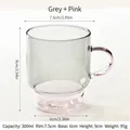 Artistic stackable heat-resistant glass coffee mug with grey body and pink handle - Grey + Pink