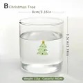 Heat-resistant 400ml clear glass water cup featuring a creative Christmas tree relief design - Christmas Tree Cup / 400ml
