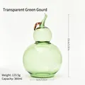 Tarro de almacenamiento de vidrio en forma de calabaza verde con tapa para dulces - Verde Transparente